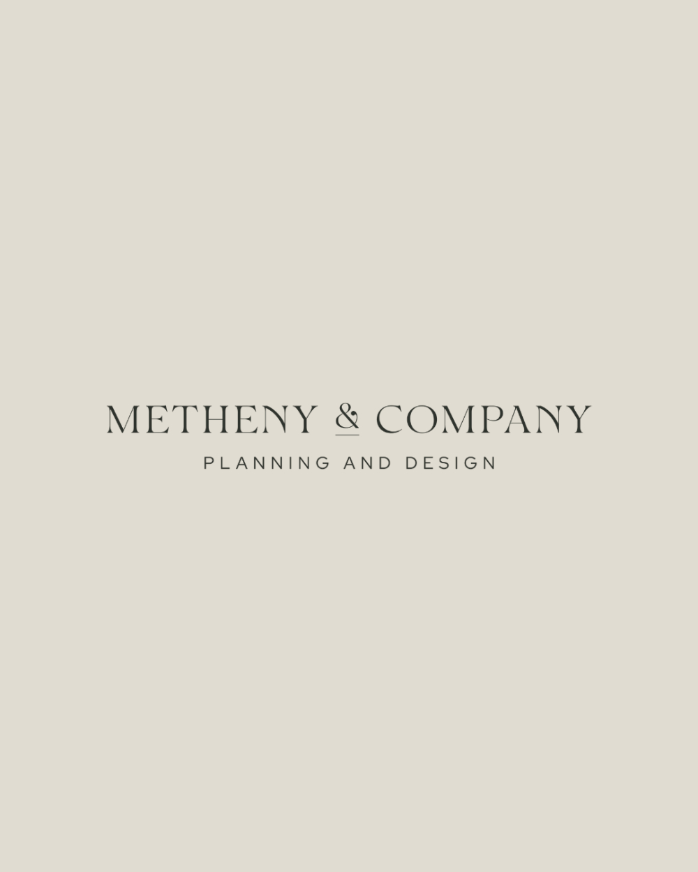 A minimalist cream background displaying the Metheny & Company Planning and Design logo in classic serif typography, used as brand identity for a luxury wedding planner website.
