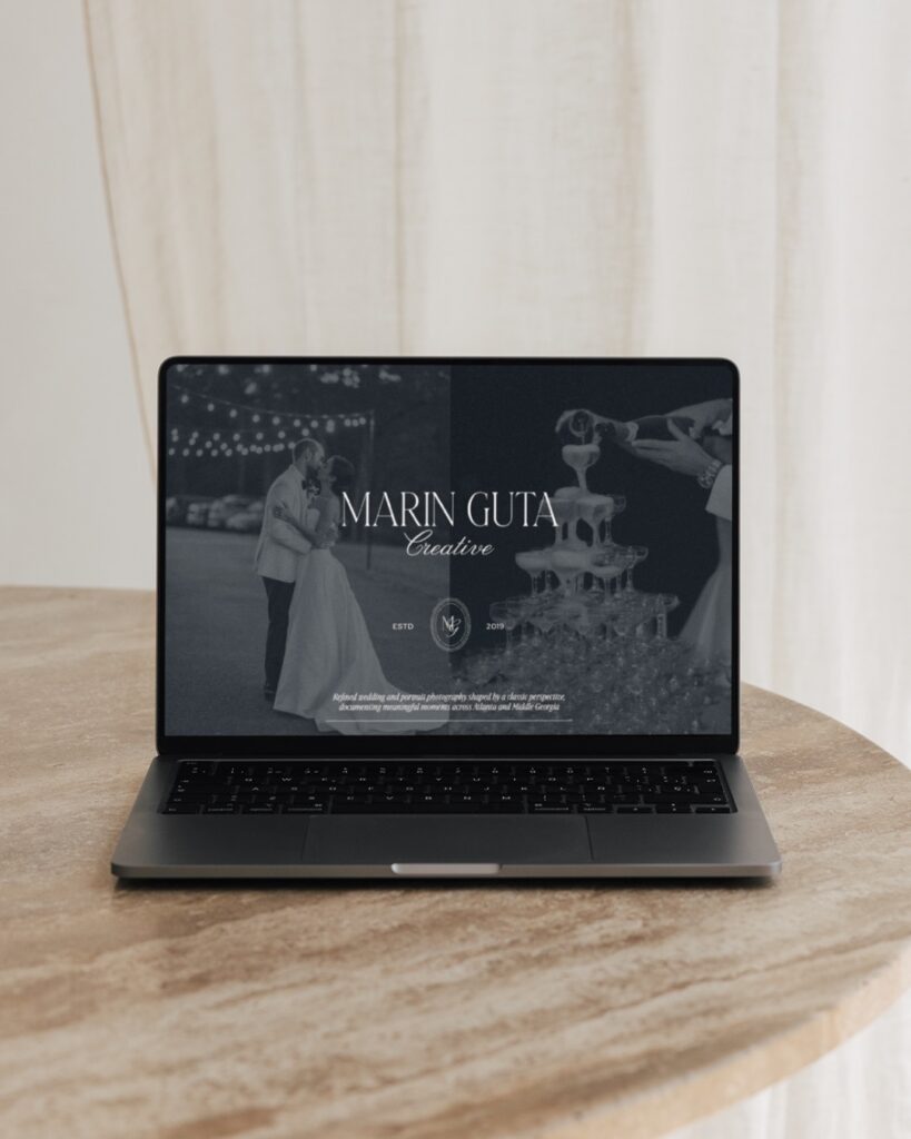 Marin Guta website homepage on laptop
